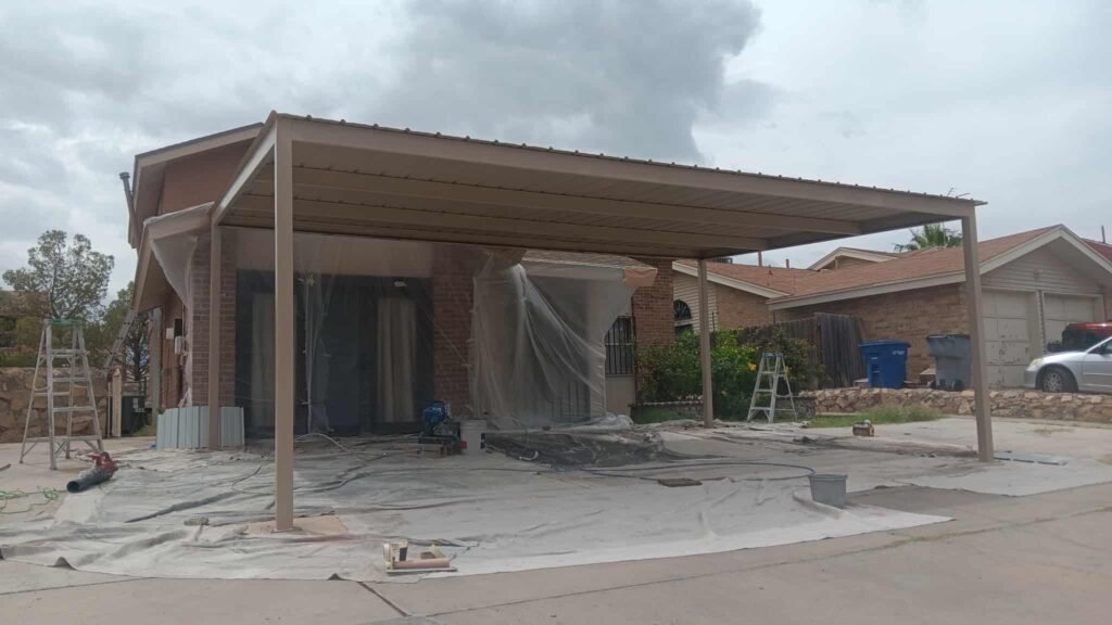 Patio cover being prepped and coated