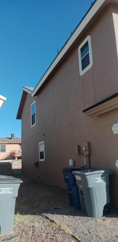 Stucco wall repaired and recoated on an El Paso home
